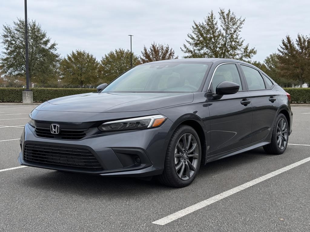 Gray Honda Civic sedan available for weekly rental