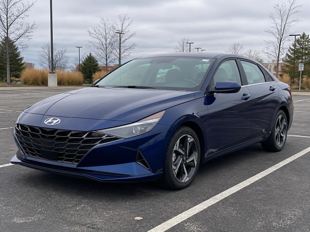 Blue Hyundai Elantra sedan available for weekly rental